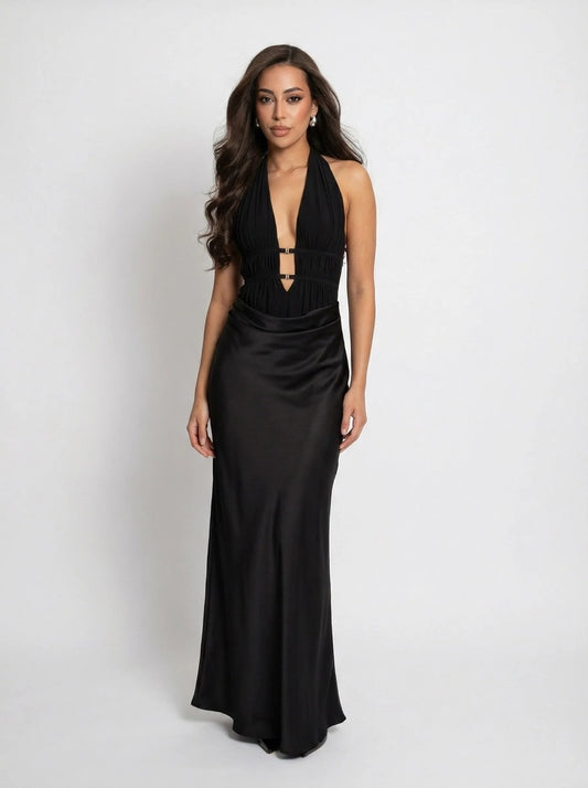 Woman wearing a black evening gown on a white background