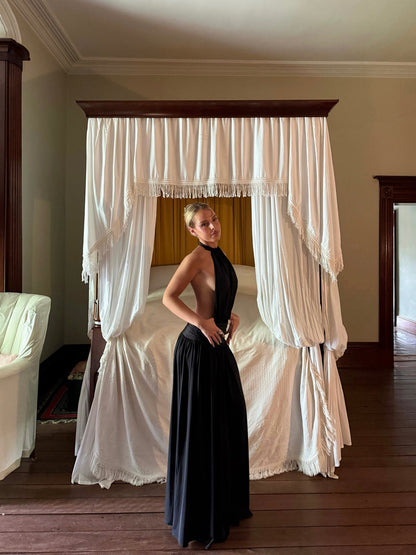 Black halter gown, front pose, canopy bedroom