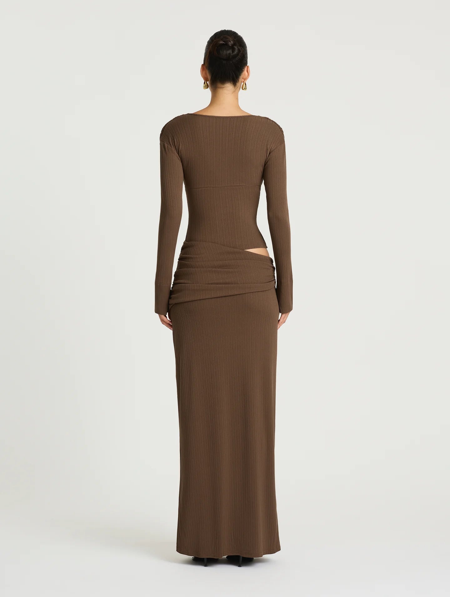 Brown long-sleeve dress with cutout detail on a white background